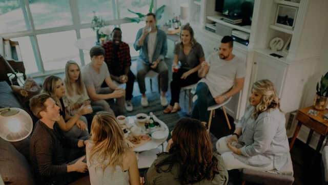 community group meeting in a living room
